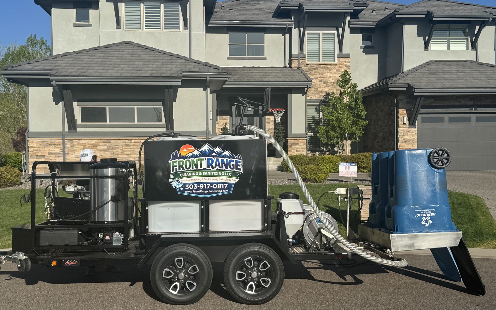 Front Range Cleaning and Sanitizing trailer rig at a residential job site in Highlands Ranch