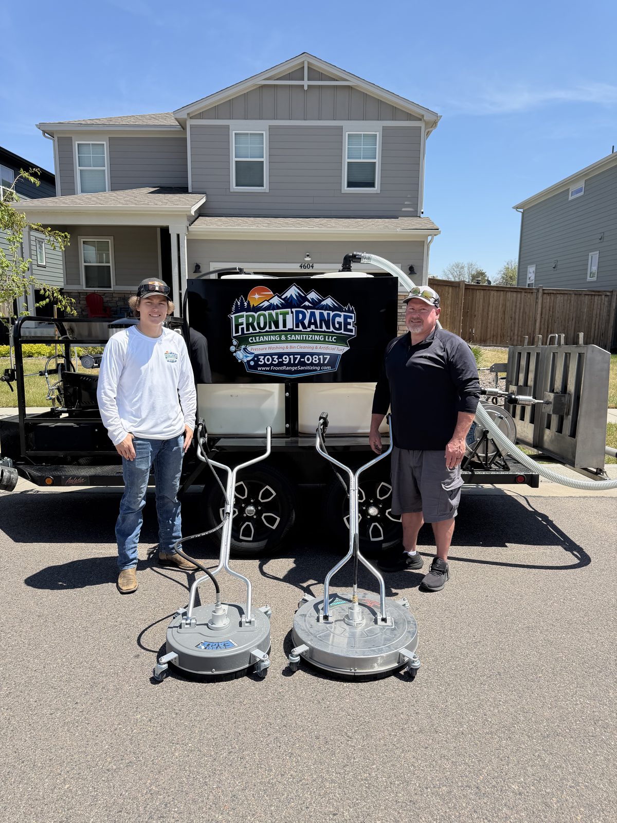 Michael and Jon Freddolino with the Front Range cleaning trailer